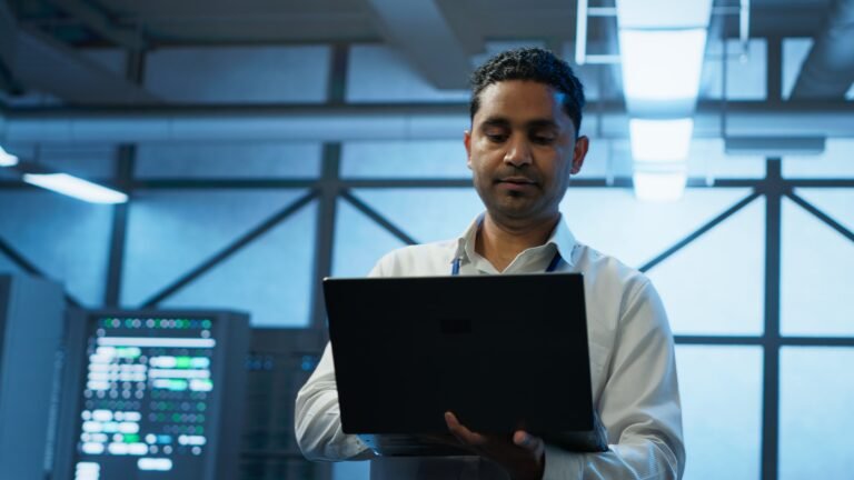 System administrator in data center managing servers